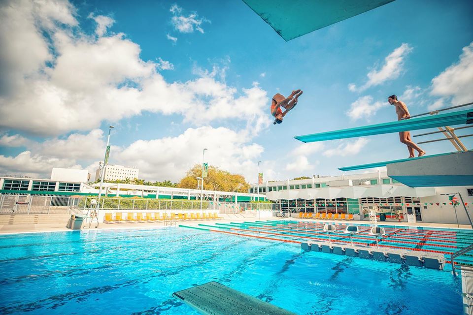 Students enjoying the Olympic-sized swimming pool